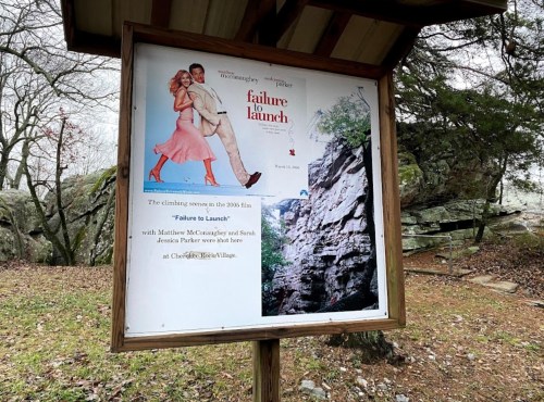 Sign featuring promotional material for the film "Failure to Launch," with images and details about filming locations.