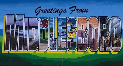 Colorful mural reading "Greetings From Middlesboro," featuring local landmarks and symbols.