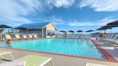 A sunny pool area with lounge chairs, umbrellas, and a clubhouse, surrounded by a clear blue sky.