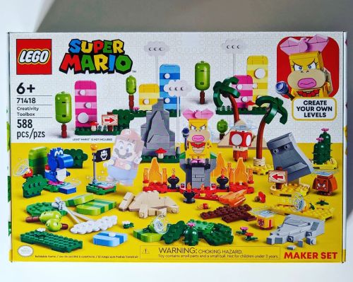 LEGO Super Mario Creativity Toolbox set with colorful blocks, characters, and accessories for building custom levels.