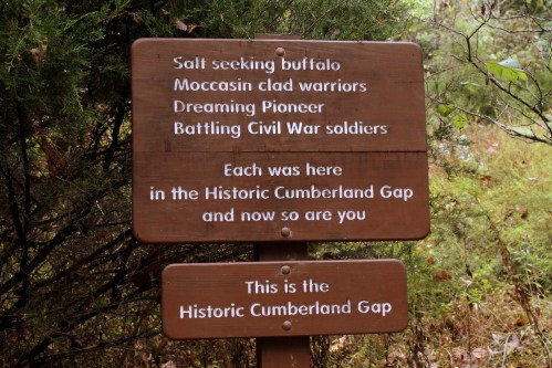 Sign at Historic Cumberland Gap highlighting its historical significance with references to buffalo hunters, pioneers, and Civil War soldiers.