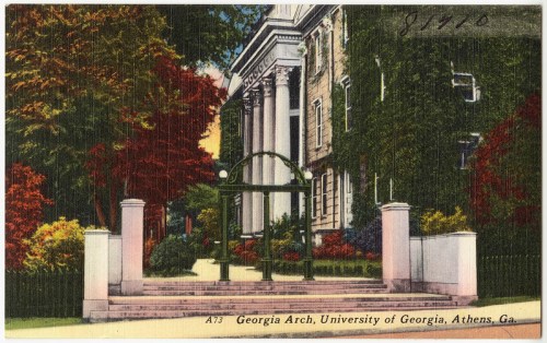 Colorful postcard of the Georgia Arch at the University of Georgia, surrounded by trees and historic buildings.
