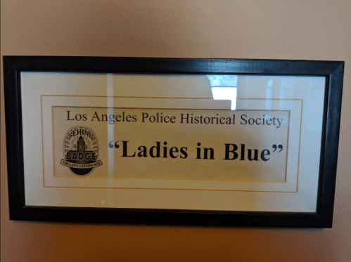 Framed sign for the Los Angeles Police Historical Society titled "Ladies in Blue."
