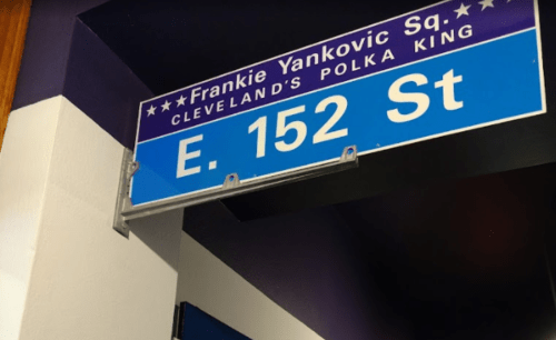 Sign for Frankie Yankovic Square at E. 152 St, honoring Cleveland's Polka King.