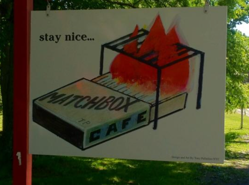 Illustration of a matchbox with flames, featuring the text "stay nice..." above it.