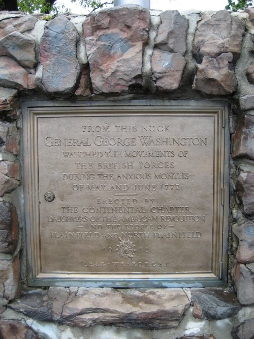 Plaque commemorating General George Washington's observation of British forces in May and June 1777, mounted on a stone wall.