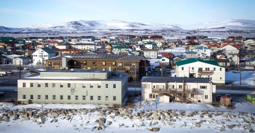 A panoramic view of the small town of Nome, Alaska, on a winter day.