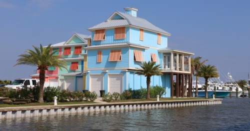 colorful houses located on the water in grand isle louisiana