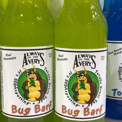 Two bottles of brightly colored soda labeled "Bug Barf" in kiwi pineapple flavor, with a cartoon bug on the label.