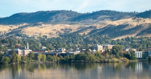 view of klamath falls oregon from across a lake