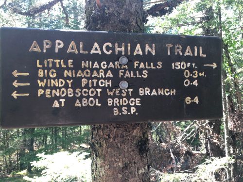 Signpost for the Appalachian Trail with directions to Little Niagara Falls, Big Niagara Falls, Windy Pitch, and Penobscot West Branch.
