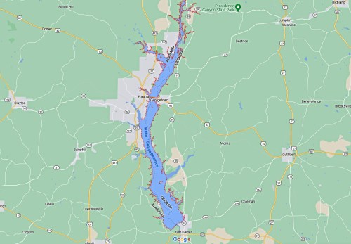 Map showing a lake with surrounding roads and towns, highlighting the area around Canyon State Park.