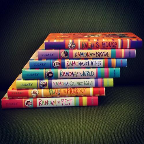 A stack of colorful children's books by Beverly Cleary, featuring titles like "Ramona the Pest" and "Ralph S. Mouse."