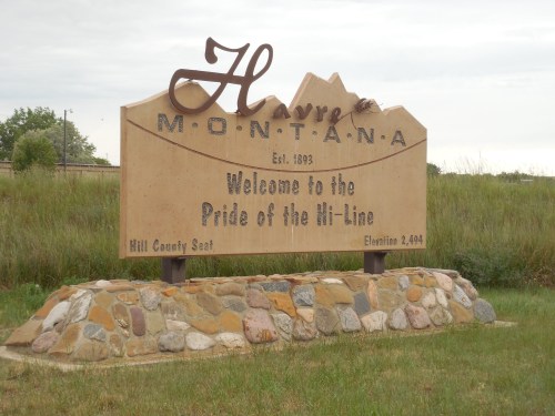 Welcome sign for Havre, Montana, established in 1893, highlighting its elevation and status as Hill County seat.