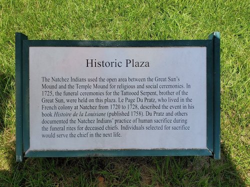 Sign describing the Historic Plaza, detailing Natchez Indian ceremonies and the influence of French colonist Le Page Du Pratz.
