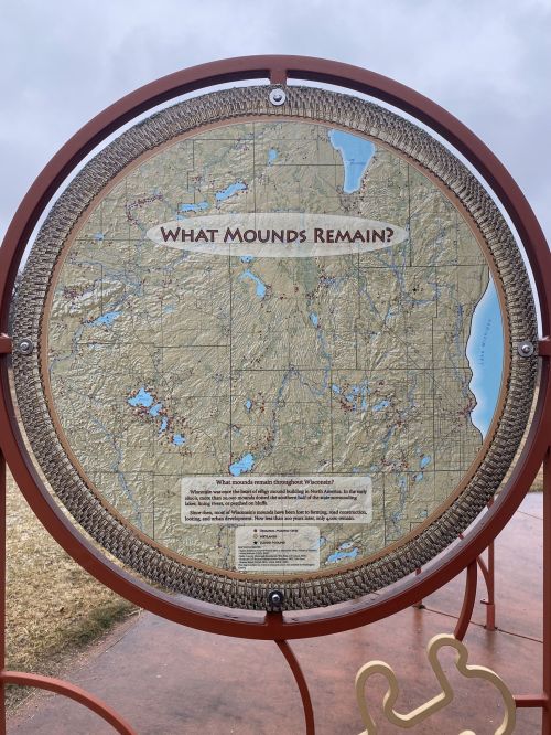 A circular map display titled "What Mounds Remain?" showing a detailed topographic map of the area.