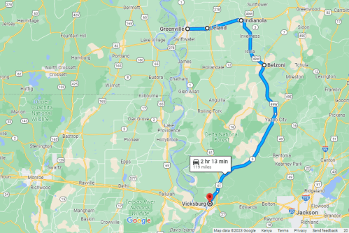 Map showing a route from Vicksburg to Indianola, highlighting Greenville and Belzoni, with a travel time of 2 hours 13 minutes.