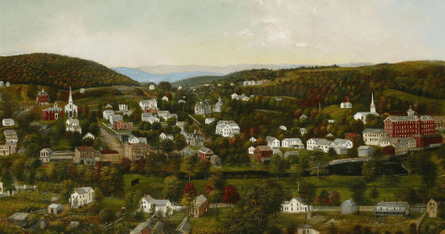 A panoramic view of a quaint town surrounded by hills, featuring houses, churches, and autumn foliage.