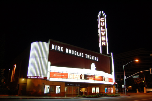 Culver City’s Kirk Douglas Theatre illuminated at night, showcasing its marquee and classic architecture.