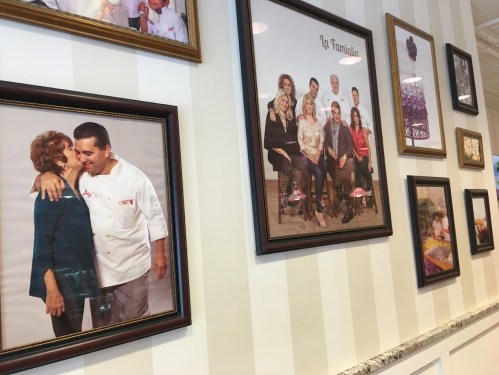 A wall adorned with framed family photos, showcasing warm moments and gatherings.