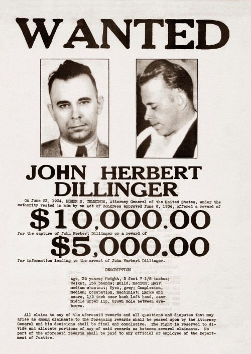 Wanted poster for John Herbert Dillinger, offering a reward of $10,000 for his capture, with two photographs and description.