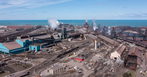 aerial shot of the industrial district of gary indiana along the shores of lake michigan