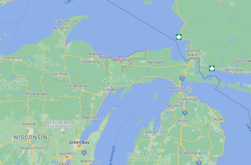 Map of northern Michigan, highlighting areas like Munising and Hiawatha National Forest, near Lake Superior.