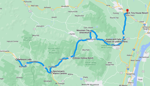 Map showing a route from Belleayre Lake to A Tiny House Resort in South Cairo, highlighting nearby attractions and trails.