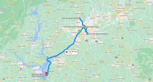 Map showing a route from Big Water Marina and Campground to Furman Rose Garden, highlighting nearby parks and nature preserves.