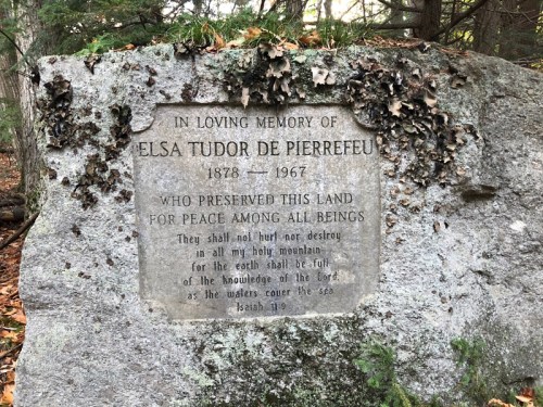 A stone memorial for Elsa Tudor de Pierrefeu (1878-1967) honoring her preservation of land for peace among all beings.