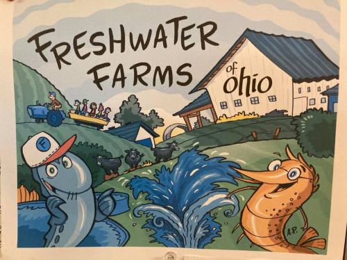Cartoon illustration of fish and a farm, with "Freshwater Farms of Ohio" text and a scenic rural background.