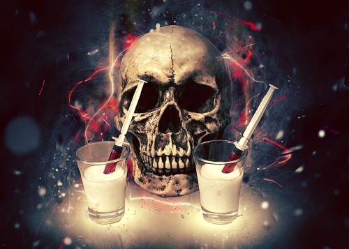A skull between two glasses filled with white liquid and syringes, creating a spooky, eerie atmosphere.
