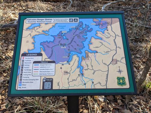 Map of Calcasieu Ranger District in Kisatchie National Forest, showing trails, camping sites, and water features.