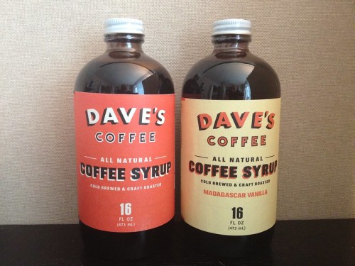Two bottles of Dave's All Natural Coffee Syrup, one labeled "Coffee Syrup" and the other "Madagascar Vanilla."