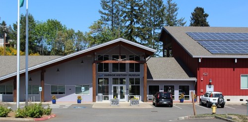 Exterior view of the Harbor History Museum, featuring a modern design and solar panels on the roof.