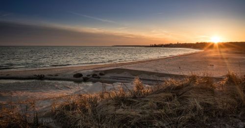 The sunset over Harnkess State Park in Waterford, Connecticut