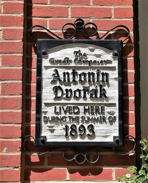 Sign commemorating composer Antonin Dvořák, noting he lived there during the summer of 1893.