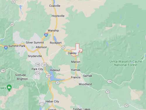 Map showing Oakley, Utah, with surrounding towns and highways in a mountainous area.