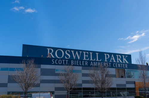 Exterior of Roswell Park Scott Bieler Amherst Center building under a clear blue sky.