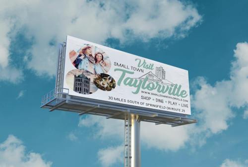 Billboard promoting Taylorville, highlighting shopping, dining, and activities, with a scenic sky backdrop.