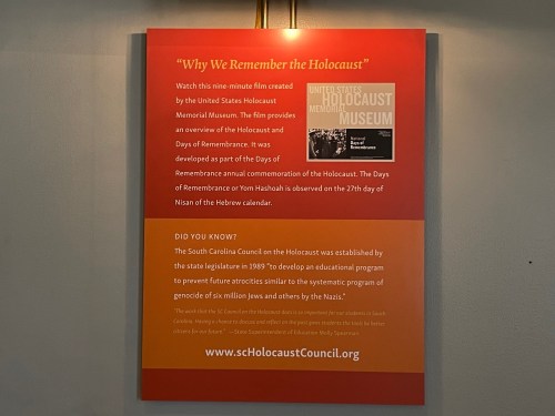 Sign explaining a film about the Holocaust, its remembrance, and the South Carolina Council on the Holocaust.