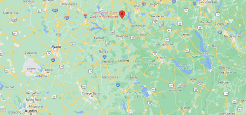 Map showing the location of Zipline Adventures in New York, Texas, surrounded by green areas and nearby towns.