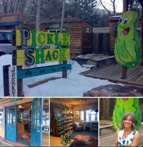 A colorful sign for "Pickle Shack" with a cartoon pickle, surrounded by wooden cabins and snow. Inside view and a smiling woman.