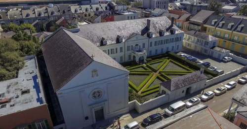 Aerial view of the historic Ursuline Convent and chapel in New Orleans with its formal garden courtyard.