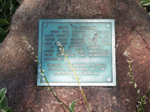 Plaque on a rock commemorating Camp McClellan, a military camp from the Civil War, detailing its history and significance.