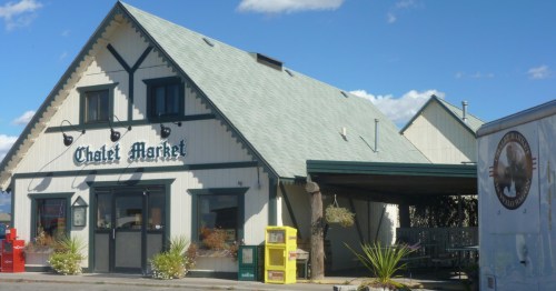 The exterior of the Chalet Market of Montana, a unique shop with a Swiss design.