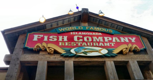 Sign for "World Famous Islamorada Fish Company Restaurant" with a colorful fish graphic.
