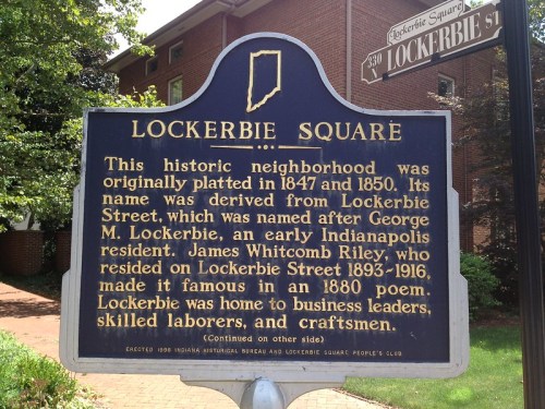 Historical marker for Lockerbie Square, detailing its origins and notable residents in Indianapolis.