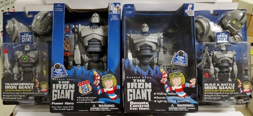 Four boxed action figures from "The Iron Giant," featuring different characters and play features.