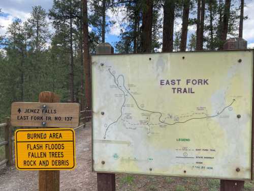 Trail map for East Fork Trail, with a warning sign about burned areas, flash floods, and fallen trees.